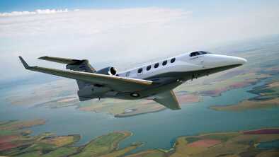 Embraer Phenom 300 in flight Embraer Phenom 300 in flight