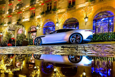 Aston Martin DBS superleggera behind the Hôtel Plaza Athénée Aston Martin DBS superleggera behind the Hôtel Plaza Athénée