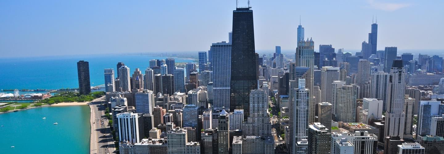 Aerial view of the city of Chicago with its skyscrappers and its famous long beach