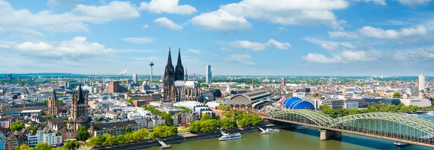 Aerial view of Cologne’s Grand Gothic Cathedral with the Colonius Broadcasting Tower in background