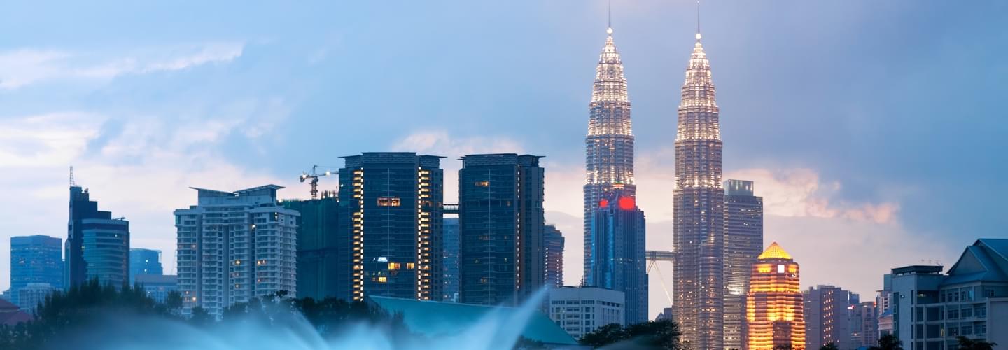 Photo of the skyscrapers of kuala lumpur at the sunset