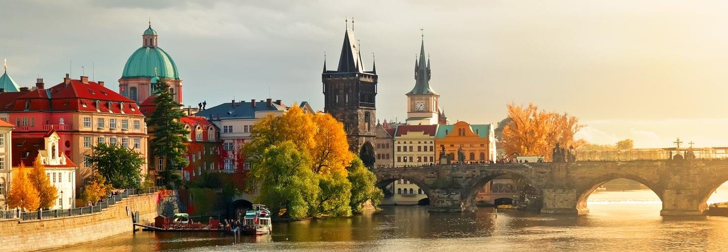 Skyline of Charles Bridge and old tower in Prague in Czech Republic in the sunset