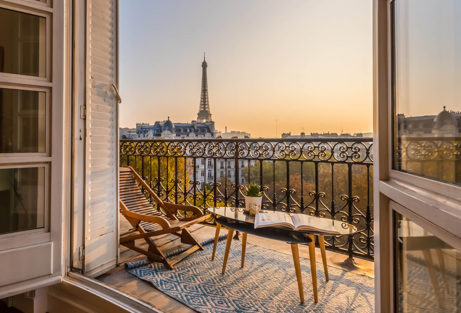 paris balcony with a splendid view of the eiffel tower at sunset