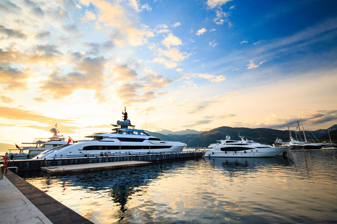 Luxury yacht marina. Port in Mediterranean sea at sunset.
