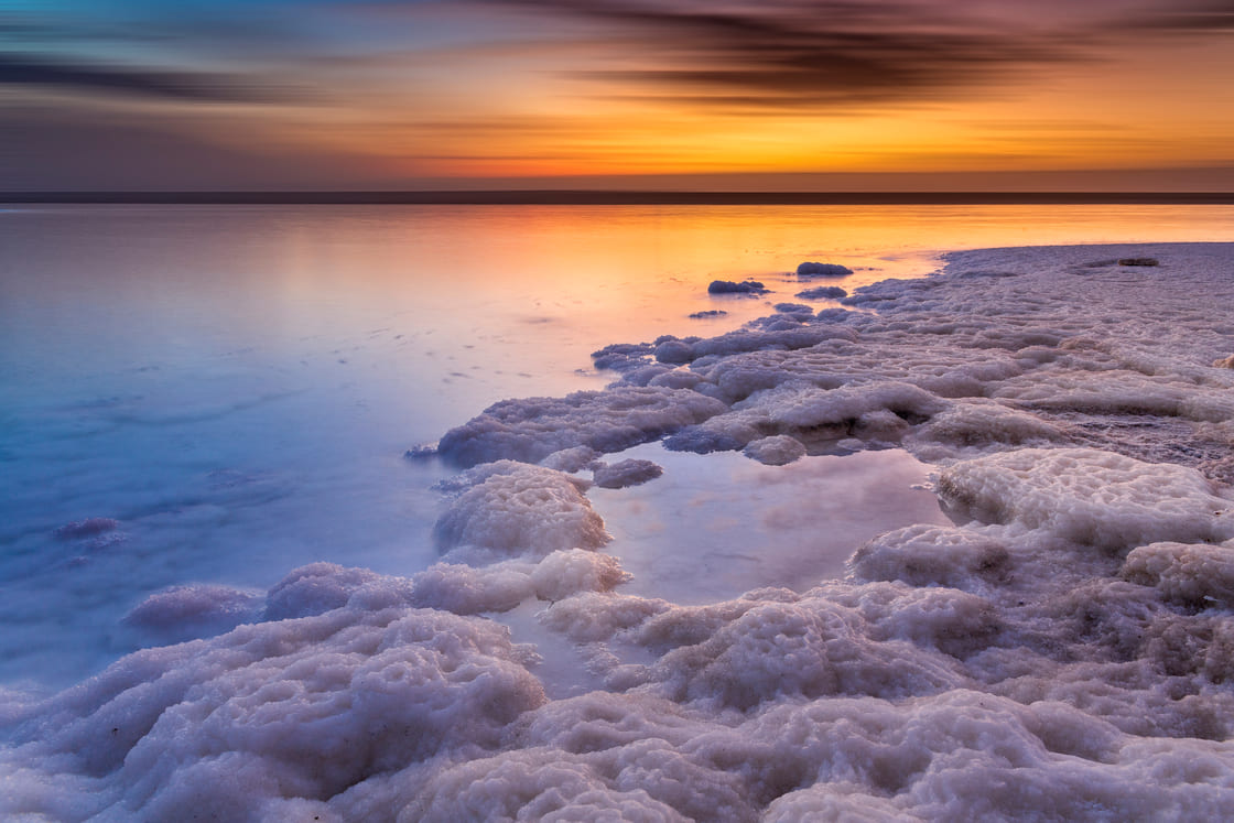 Dead sea with salt at dawn