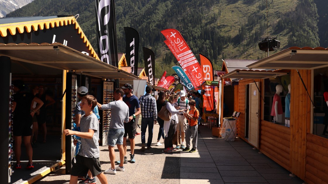 People shopping in the stores of the Ultra Trail du Mont Blanc.