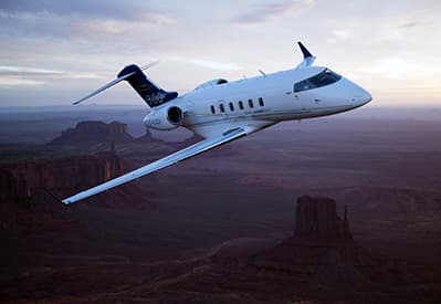 Super Midsize Jet Bombardier Challenger 300 to hire for private jet charter with LunaJets, medium-haul flights, spacious and luxurious