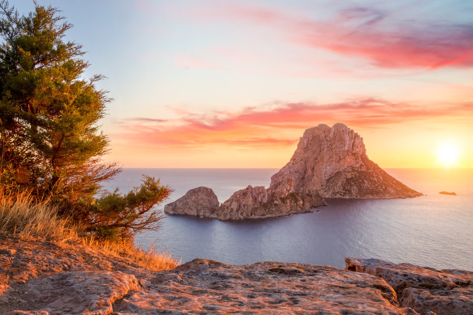 View of Es Vedrà from Ibiza at sunrise