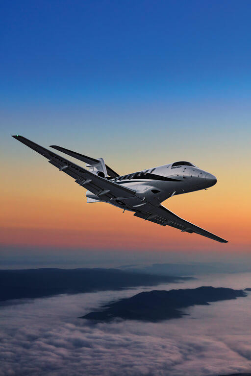 Бизнес-джет Pilatus PC-24 летит над облаками (Copyright: Pilatus Aircraft Ltd)