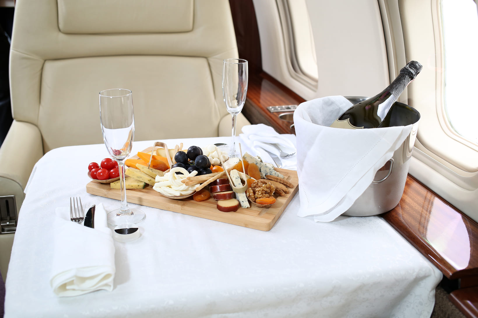 A cheese board served on a private jet flight