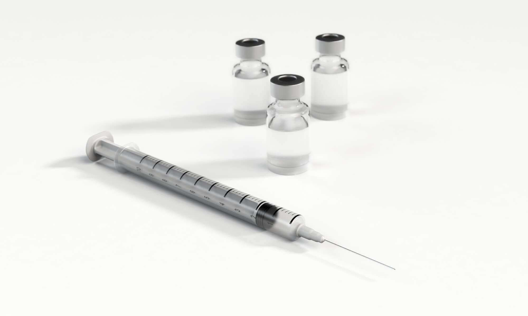 Syringe with two bottles of vaccine