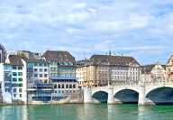 Bridge Mittlere Brücke on the Rhin with several buildings including the Martinskirche in Basel Switzerland