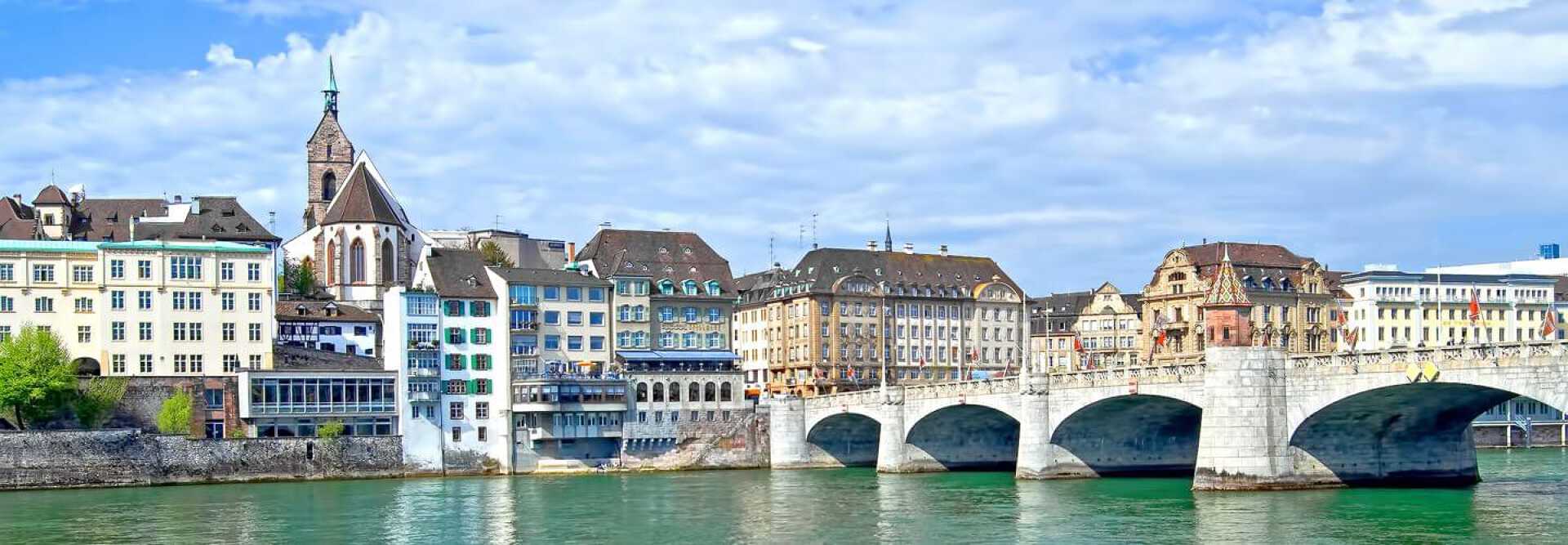 Bridge Mittlere Brücke on the Rhin with several buildings including the Martinskirche in Basel Switzerland