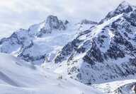 Photo of the snowy mountains of Courmayeur in the Aosta Valley in Italy