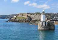 Entrance of Saint Peter Port on Guernsey Island with the Castle Cornet in background