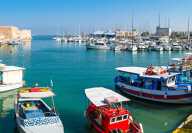 The port of Iraklion in Greece with many small fishing boats