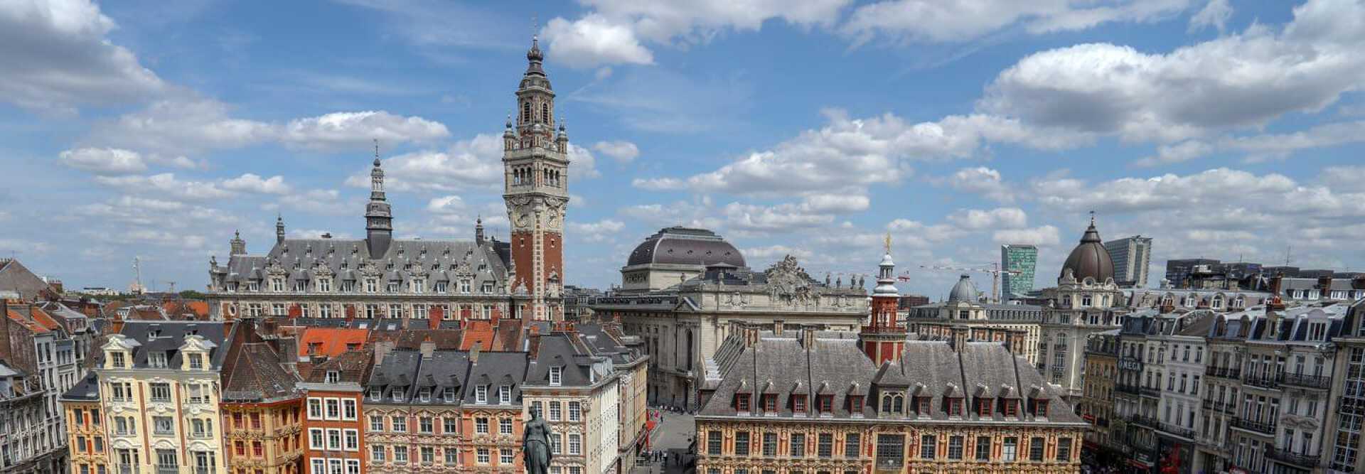 Aerial view of the roofs of the city of Lille in France under a cloudy sky