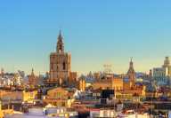 Sunset skyline of Valencia in Spain with a focus on the tower of the Valencia cathedral