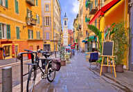 Nice colorful street architecture and church view, tourist destination of French riviera, Alpes Maritimes depatment of France