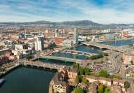 Aerial view on river and buildings in City center of Belfast Northern Ireland. Drone photo, high angle view of town
