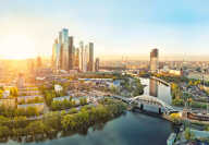 Sunrise over Moscow City district and Moscow river
