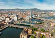Aerial view on river and buildings in City center of Belfast Northern Ireland. Drone photo, high angle view of town
