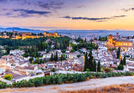 Alhambra of Granada, Spain. Alhambra fortress and Albaicin quarter at twilight.
