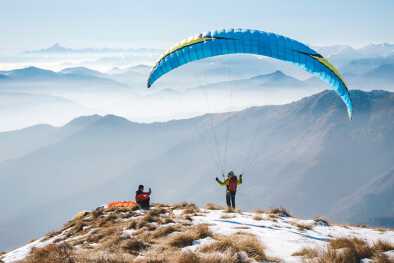 paragliding on the alps mountains
