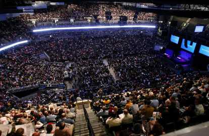 Large conference rooms filled with people for the Berkshire Hathaway Shareholders Meeting in Omaha Nebraska