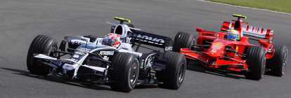 Black racing car followed by a red Ferrari at the Russian Formula 1 Grand Prix Sotchi