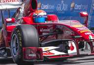 Ferrari's red racing car with sponsors at the US Formula 1 Grand Prix 