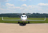 Super Large Business Jet Dassault Falcon 900EX EASy to charter for private aviation flights with LunaJets, modern exterior and a luxurious cabin