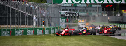 Voiture de course Ferrari tournant au Grand Prix de Formule 1 du Canada
