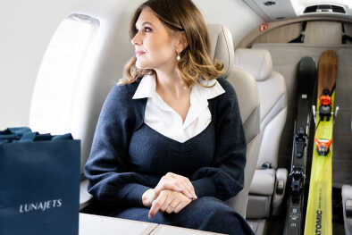 Businesswoman in the luxurious cabin of the Pilatus PC-12