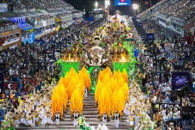 A Carnival Parade walking through the street A Carnival Parade walking through the street