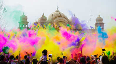 colors while the celebration of holi is happening colors while the celebration of holi is happening