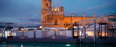rooftop pool at night in Molina lario