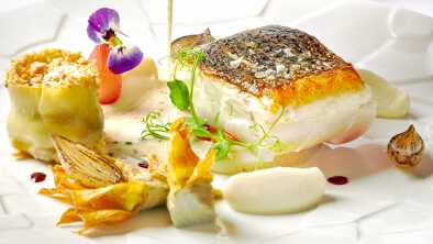 High end cuisine fish with artichokes