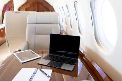 Laptop on a private jet