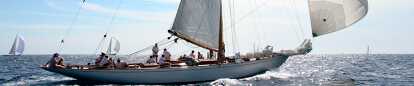 A boat on the blue sea at Voiles St Tropez in a sunny summer afternoon