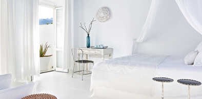luxury room with a jacuzzi in mykonos blu