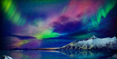 spectacular view over the sea and mountains with the lights in Iceland