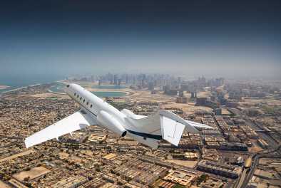 private jet charter volando sobre Doha, Qatar