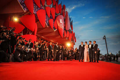 The entrance of the Venice International Film Festival with red structural elements in the sunlight 