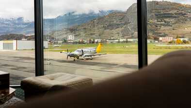View of the runaway at the Sion airport with a Pilatus PC-12  