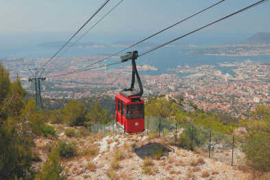 Cableway over seaside city. Toulon, France