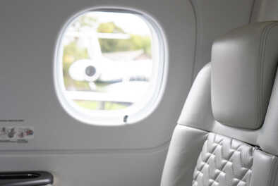 the window of a private jet